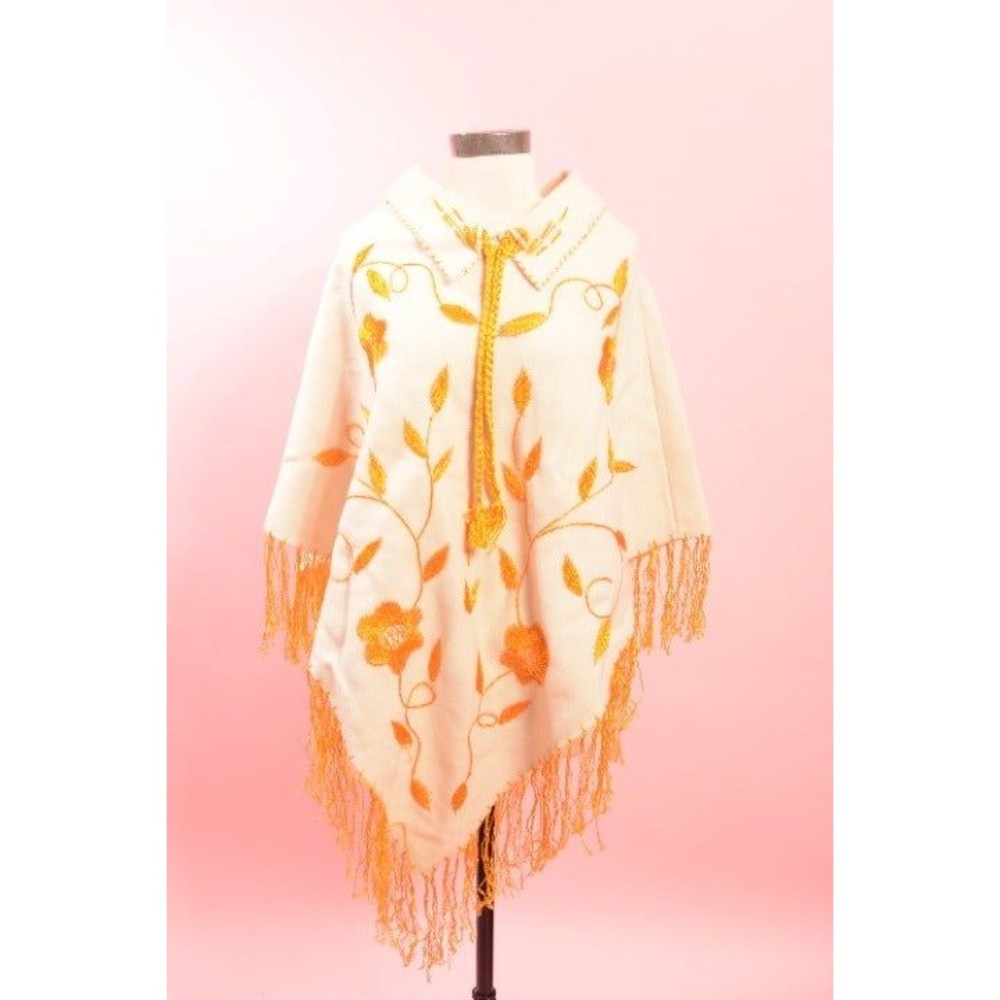 1970's Wool embroidered poncho with fringe.